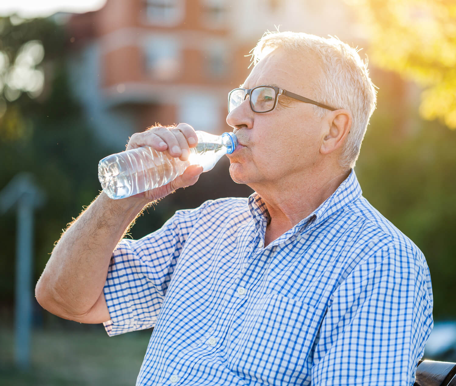 Man drinking from a water bottle